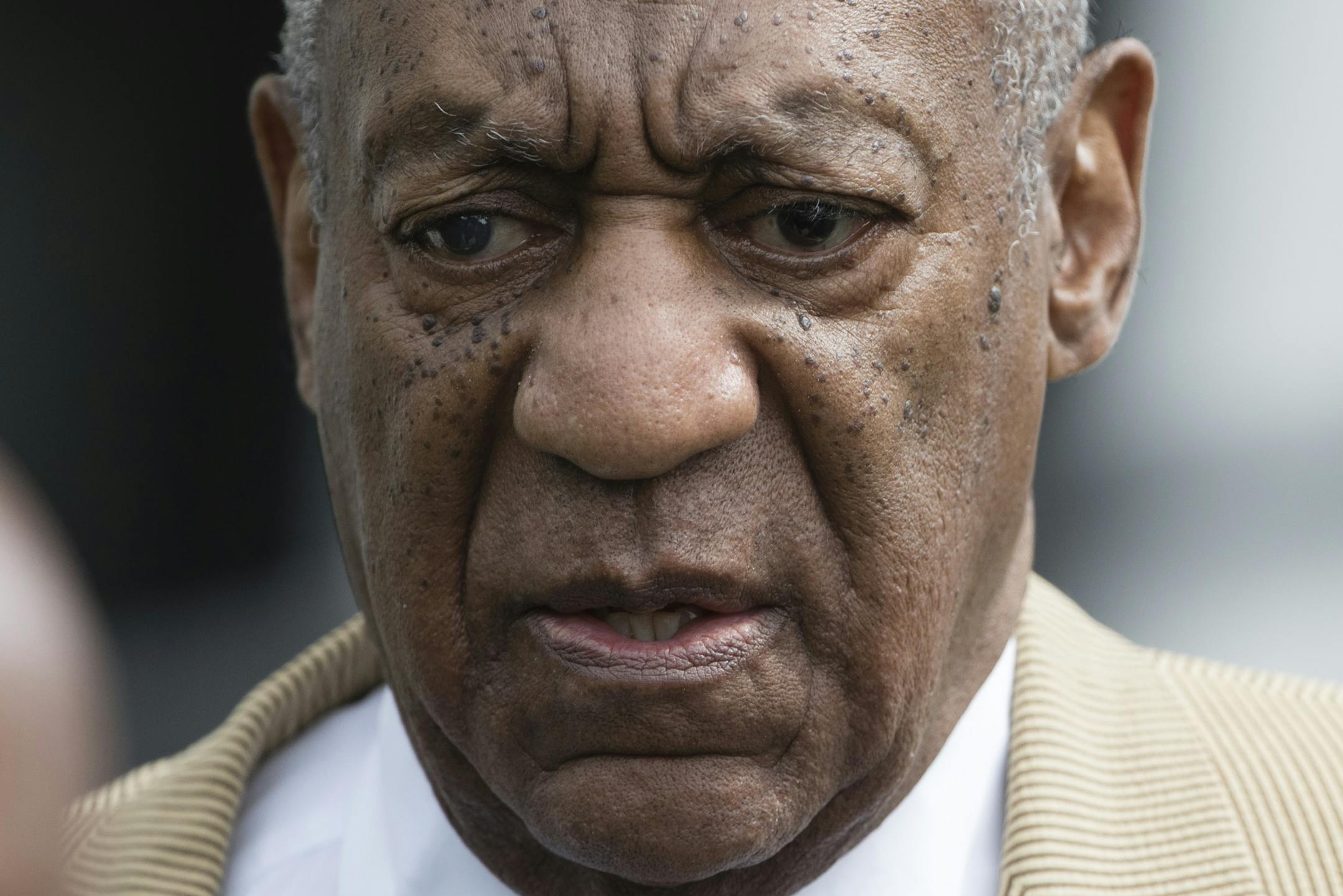 Bill Cosby leaves a pretrial hearing in his criminal sex-assault case at Montgomery County Courthouse in Norristown, Pa., Thursday, July 7, 2016. A Pennsylvania judge denied Cosby's effort to compel the accuser in his case to testify before trial. (AP Photo/Matt Rourke)