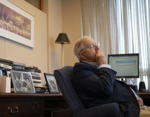 No signs of slowing: Surrounded by books, memorabilia and scheduling requests, Mondale is a fixture at the Dorsey & Whitney law offices.