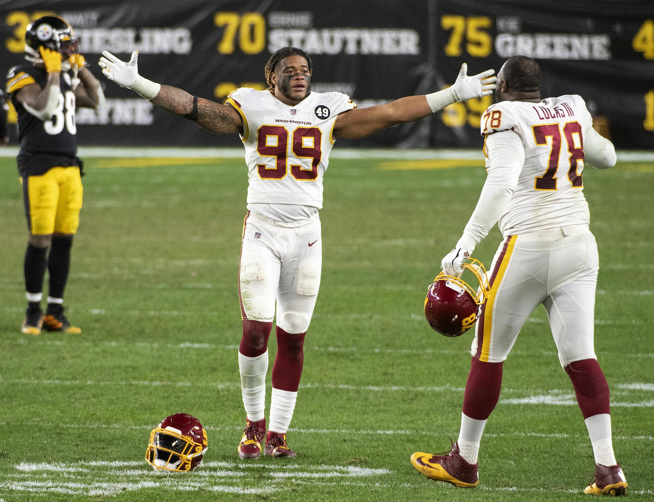 Washington Football Team defensive end Chase Young (99) celebrated with a look of disbelief after Washington defeated the Pittsburgh 23-17, ending the Steelers quest for a perfect season on Monday afternoon.