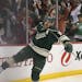 Minnesota Wild left wing Zach Parise (11) celebrated his third period goal and second of the game Sunday afternoon.