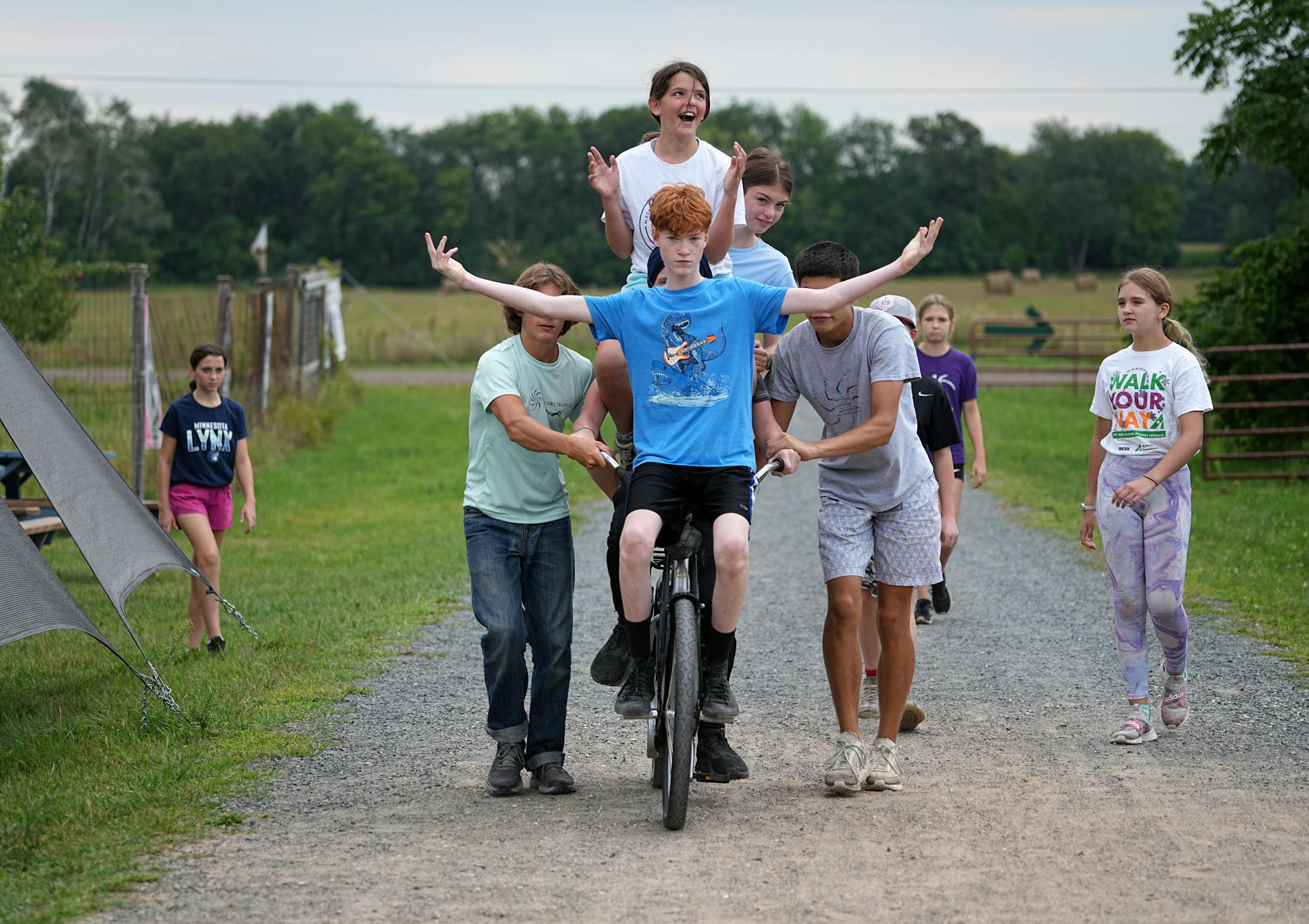 William Henke practices a formation on the bike at Flying Colors Trapeze school.