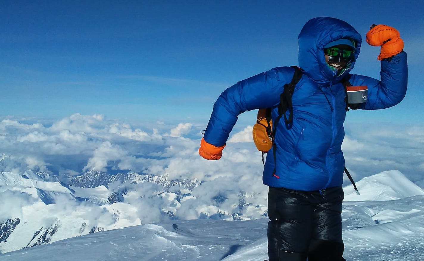 Katie Bono strikes a pose on top of Denali, the highest mountain in North America. The Minneapolis native is a former Minnesota high school cross-country skiing champ who is now living in Boulder, Colo.