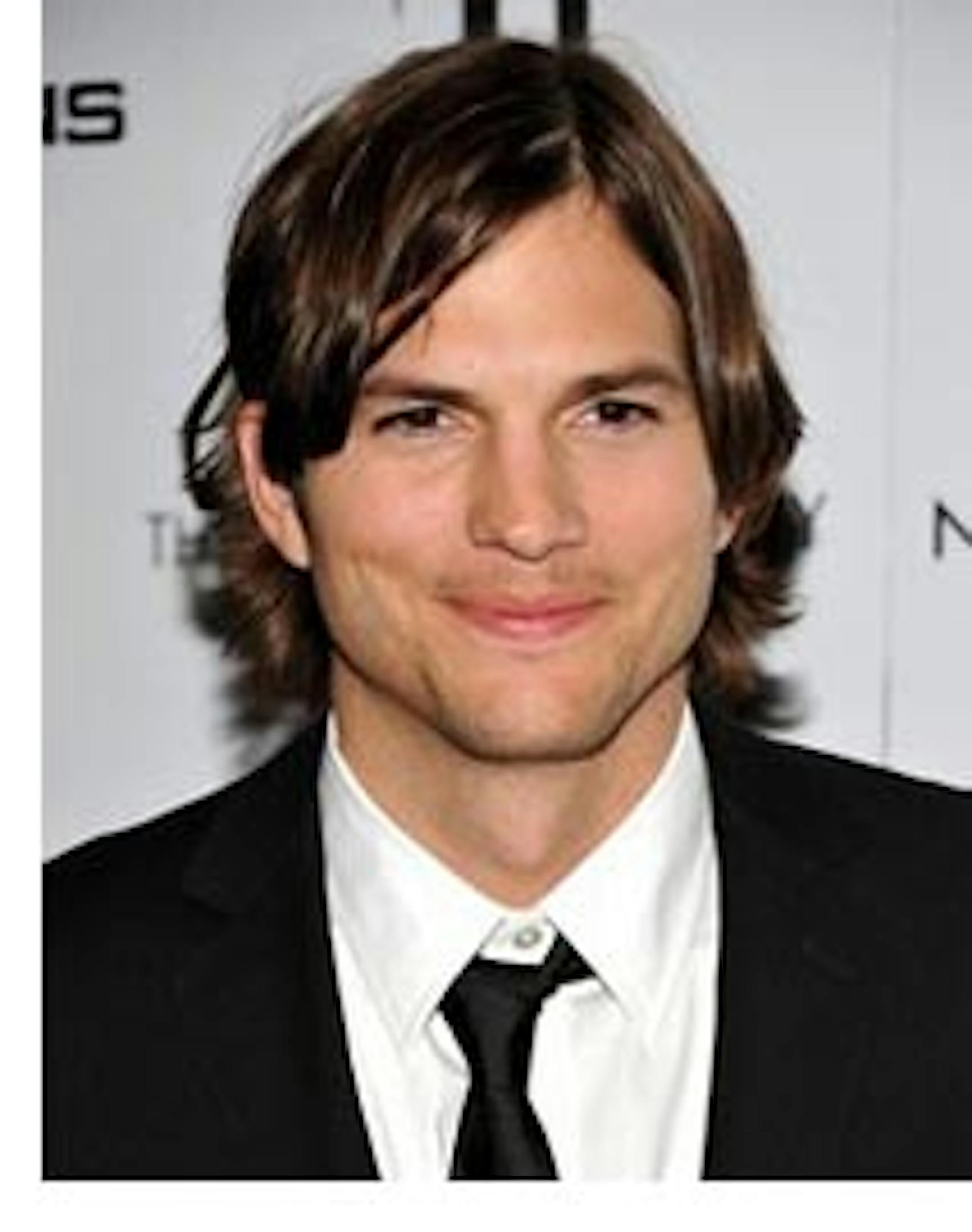 FILE - In this Jan. 20, 2011 file photo, actor Ashton Kutcher attends a special screening of "No Strings Attached" in New York. Kutcher is giving his Twitter followers a clue that he may be joining "Two and a Half Men" ' or he's punking them. A tweet Wednesday came amid reports that he's nearing a deal to replace the fired Charlie Sheen on TV's top-rated comedy. (AP Photo/Evan Agostini, File)