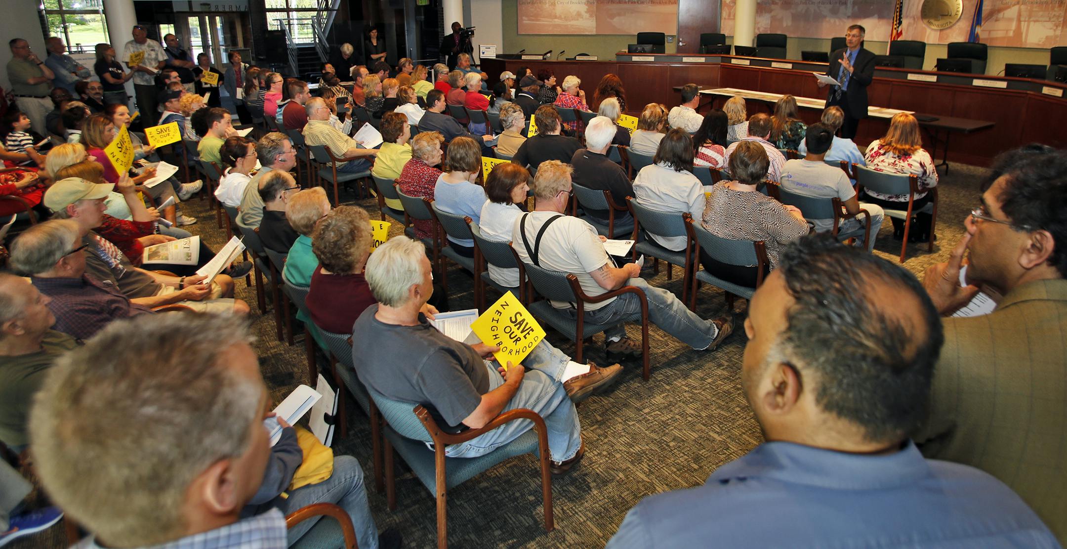 Homeowners filled the Brooklyn Park city council chambers to listen to Hennepin County officials explain the rail system. ] The light rail train system planned for expansion into the northern suburbs will necessitate the use of government eminent domain claims. Hennepin County transportation officials held a recent public meeting with Brooklyn Park home owners to answer questions about homes in the path of the planned rail system.(MARLIN LEVISON/STARTRIBUNE(mlevison@startribune.com)