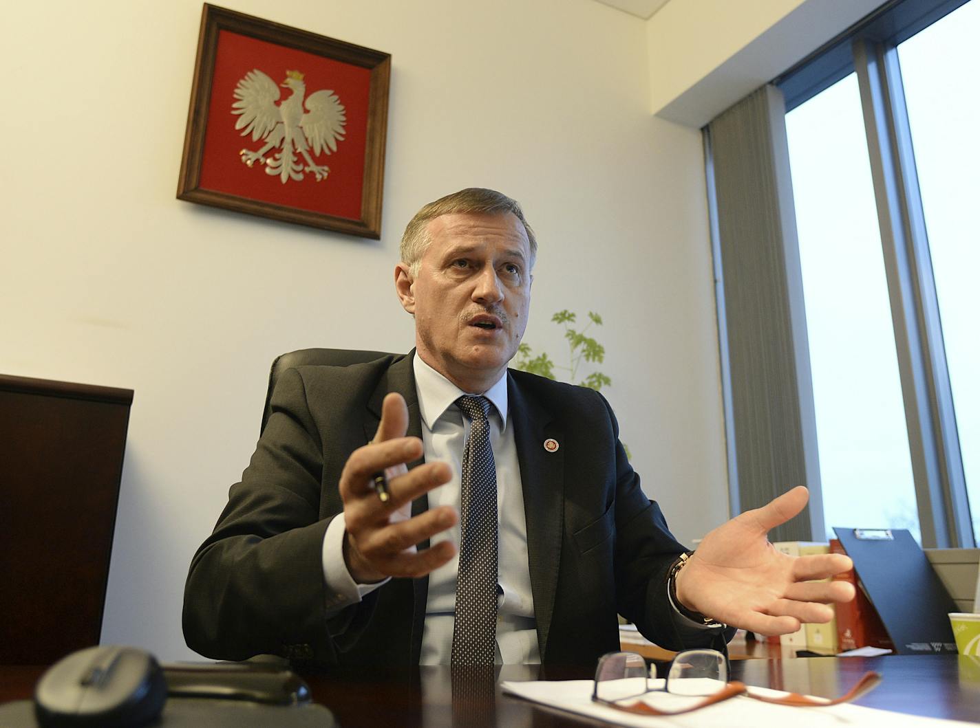 Prosecutor Andrzej Pozorski speaks during an interview with The Associated Press in Warsaw, Poland, Monday, March 13, 2017. Pozorski said that Poland will seek the arrest and extradition of a Minnesota man identified as a Nazi-era commander of an SS-led unit that burned Polish villages and killed civilians in World War II. The man has been exposed by the AP as 98-year-old Michael Karkoc.