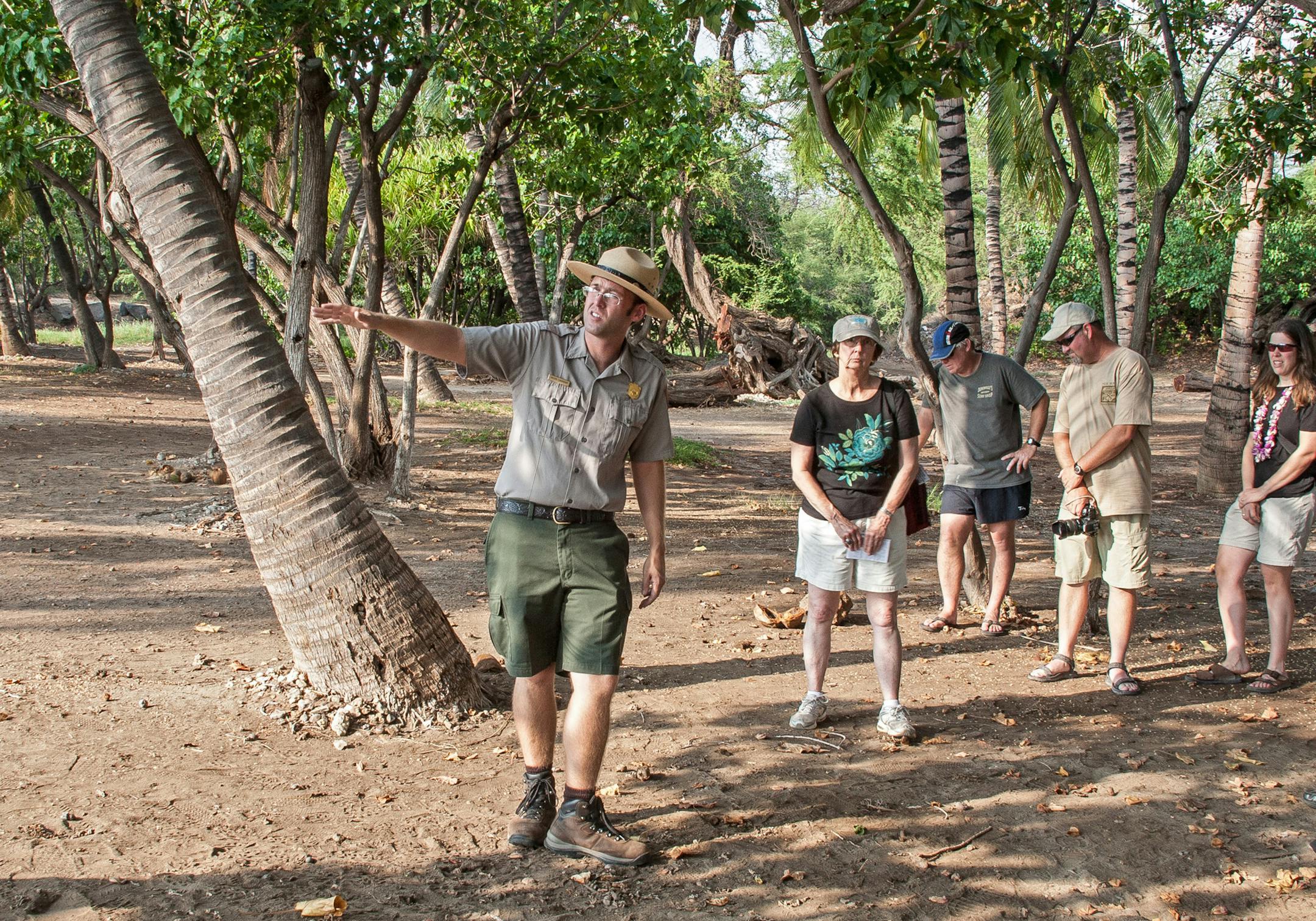 A Pu'ukohola Heiau National Historic Site guide leads visitors through the village site at Pelekane Bay where Kamehameha defeated his last rival, his cousin Keoua, in 1791, and subsequently held court, welcoming foreign visitors, including Captain George Vancouver and Russia's Otto von Kotzebue. (Steve Haggerty/TNS)