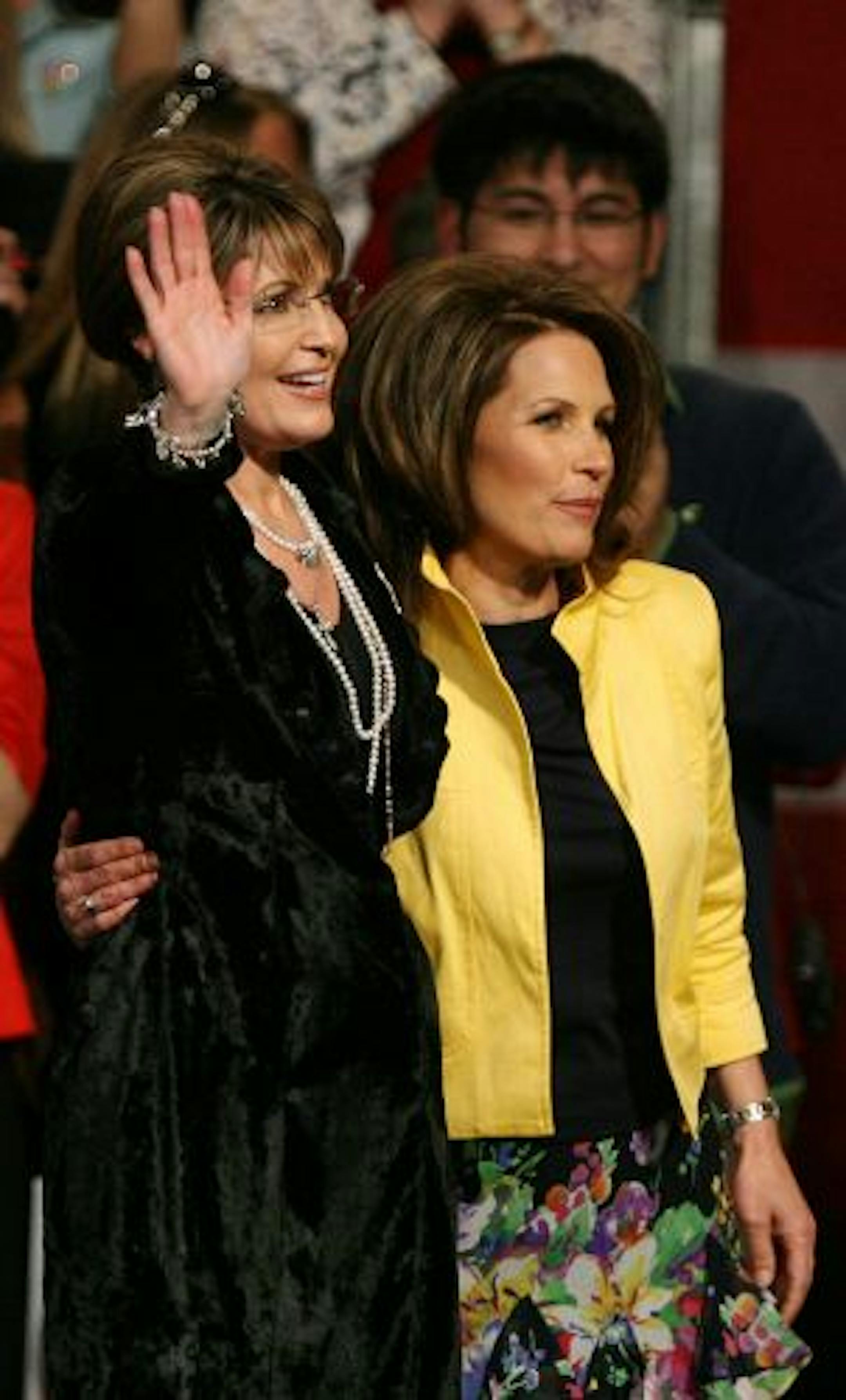 Palin and Bachmann ­during Wednesday's rally at the Minn­eapolis Convention Center.