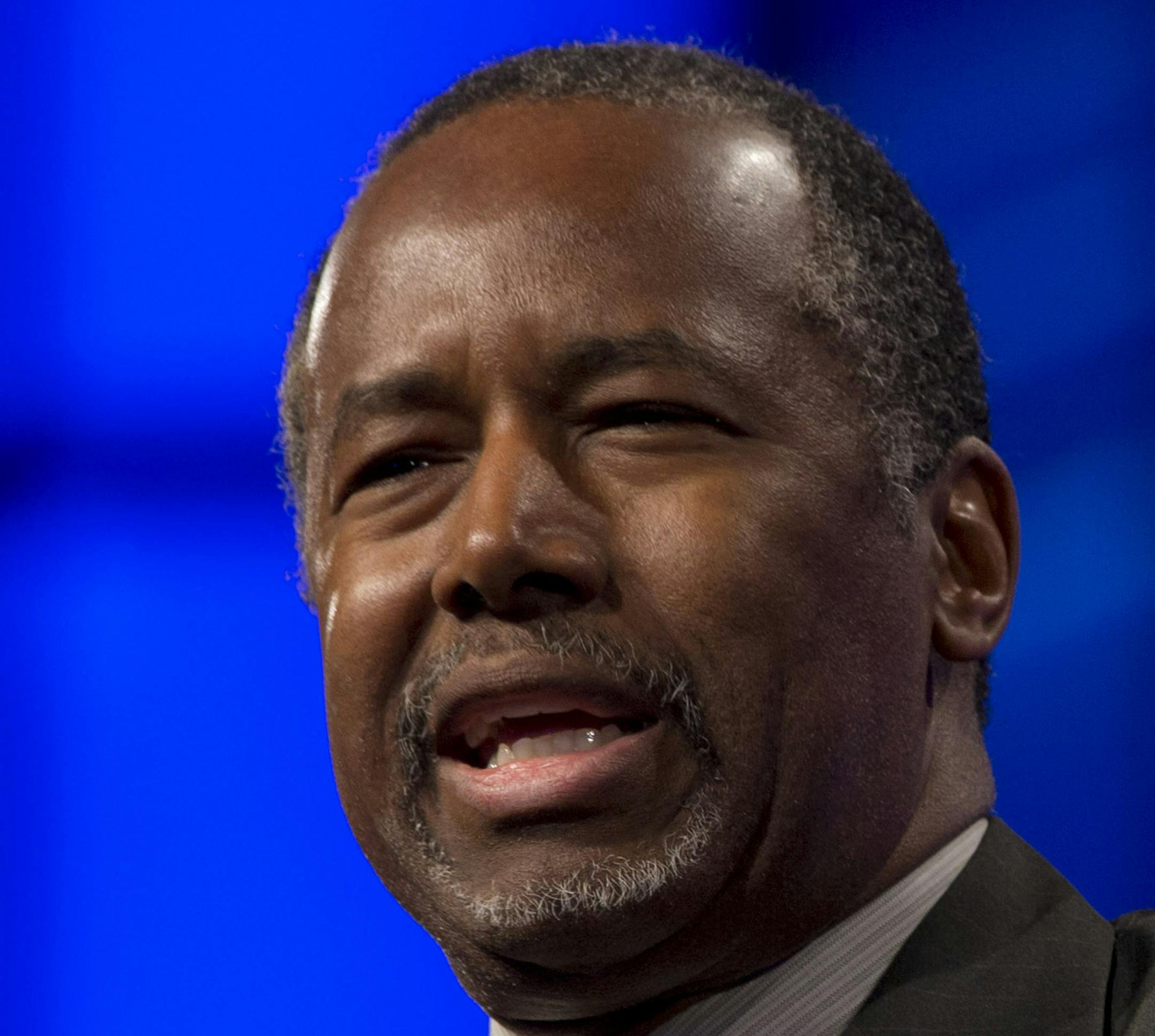 FILE - In this July 31, 2015 file photo, Republican presidential candidate, Ben Carson, speaks in Fort Lauderdale, Fla. Carson's recent poll results earned him a place in the first prime time Republican presidential debate, Thursday. (AP Photo/Wilfredo Lee, File) ORG XMIT: MIN2015080420050975