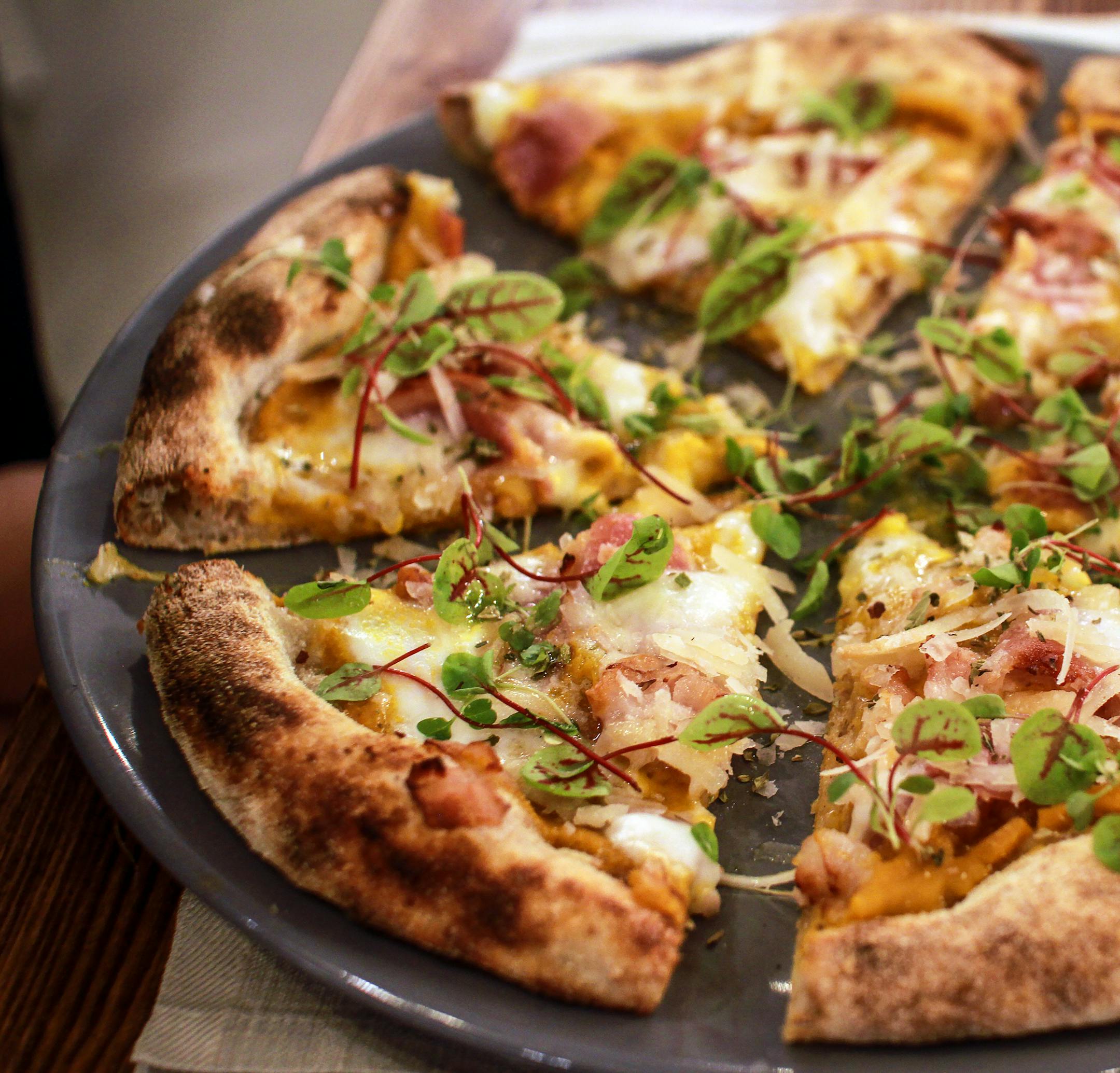 -- PHOTO MOVED IN ADVANCE AND NOT FOR USE - ONLINE OR IN PRINT - BEFORE APRIL 8, 2018. -- La Pancetta pizza at Saporè DownTown in Verona, Italy, Nov. 30, 2017. Saporè DownTown is an intriguingly experimental contemporary pizzeria that is easy to miss. (Seth Kugel/The New York Times)