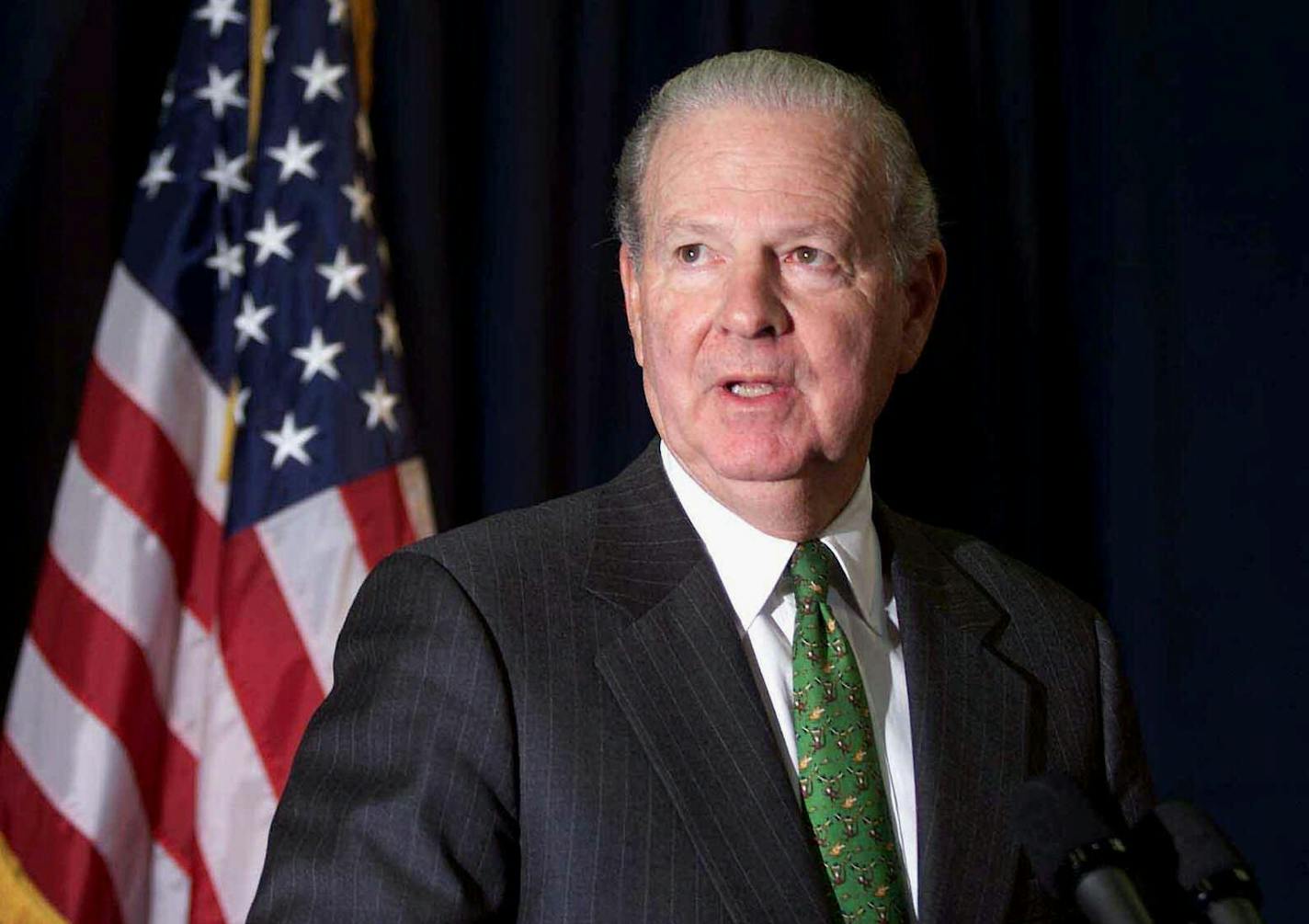 (NYT34) TALLAHASSEE, Fla. -- Dec. 12, 2000 -- ELN-SCOTUS-4 -- By a 5-4 majority, a divided Supreme Court reversed a state court decision for recounts in Florida's contested election Tuesday night, all but transforming Gov. George W. Bush, into president-elect. Former Secretary of State James Baker, who coordinated Bush's legal effort, said in a brief statement that Bush was gratified by the courts ruling, and talked about a long and arduous process for everyone involved. Baker walks off after gi