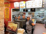 Taco John’s in the downtown Minneapolis skyway closed for good Friday. Employees, who learned about the closing Wednesday, gathered Friday just befo