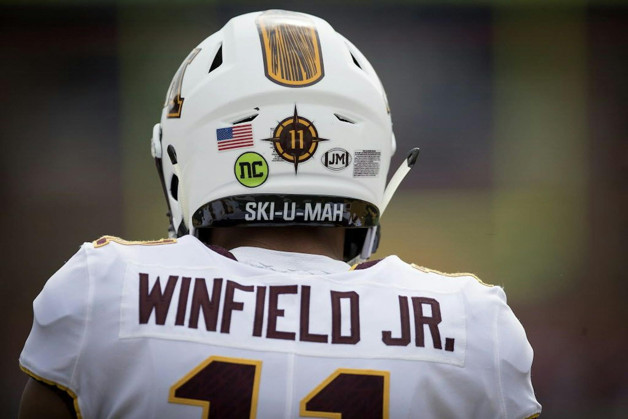 Minnesota's defensive back Antoine Winfield Jr. sported a green sticker on his helmet in memory of Nick Connelly, former offensive guard for Minnesota who died recently of cancer, before Minnesota took on Maryland at Capital One Field in College Park, MD.