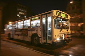 The southbound route No. 5 bus pulls away from a stop on Chicago Ave. S. near HCMC.