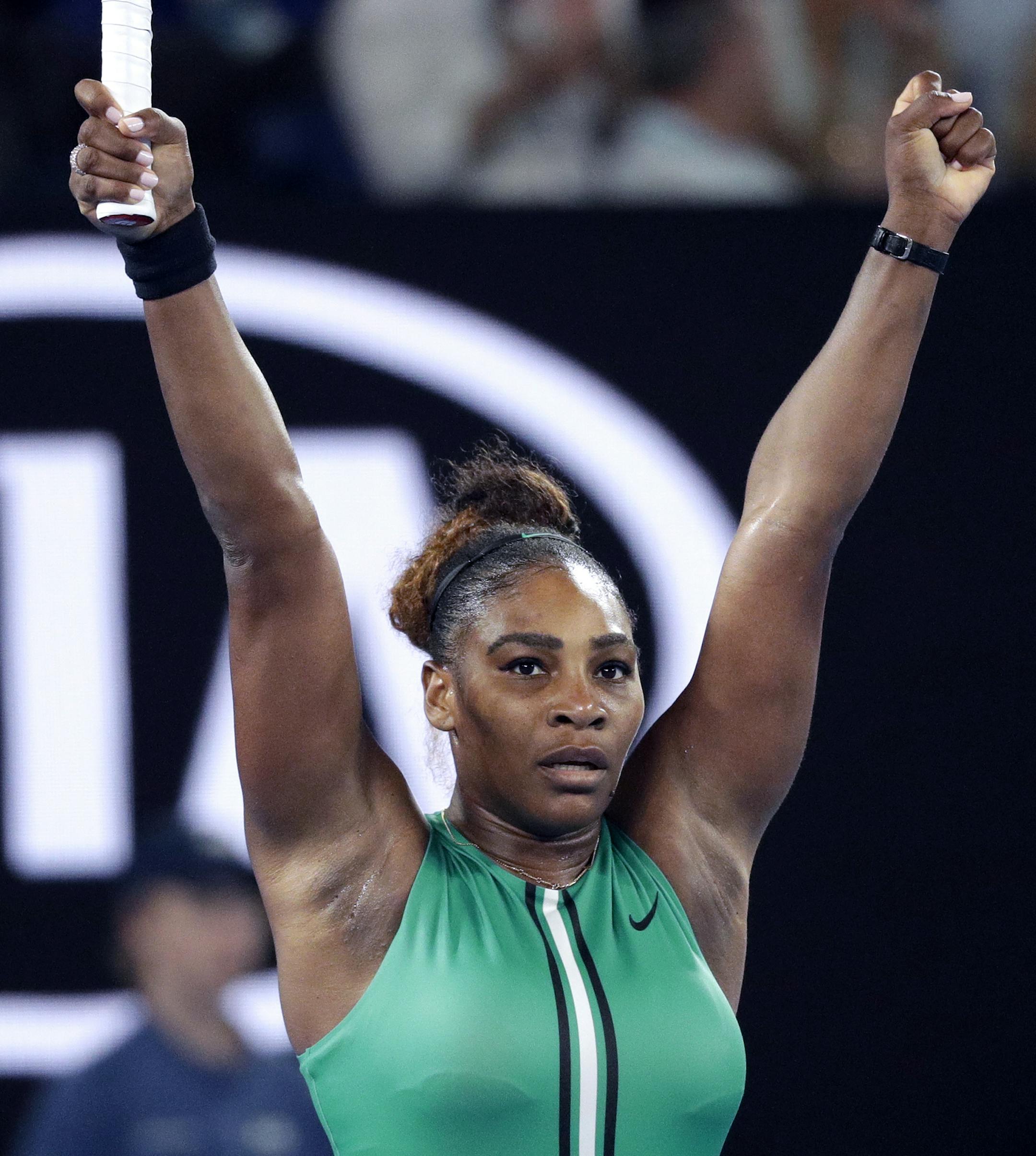 United States' Serena Williams celebrates after defeating Romania's Simona Halep in their fourth round match at the Australian Open tennis championships in Melbourne, Australia, Monday, Jan. 21, 2019. (AP Photo/Kin Cheung)