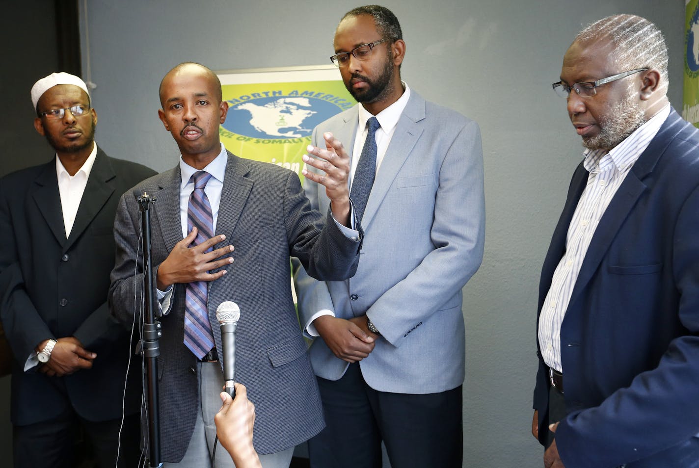 (L to R) Hassan Jama, Sadik Warfa, Jaylani Hussein and Imaam Hassan Mohamoud addressed the media at The North American Council of Somali Imaams, Inc. in Minneapolis on Wednesday. The group was opposed to the new "countering violent extremism" (CVE) program. ] CARLOS GONZALEZ cgonzalez@startribune.com - September 9, 2015, Minneapolis, MN, The Minnesota chapter of the Council on American-Islamic Relations (CAIR-MN) will hold a media availability with Muslim community leaders to react to today's la