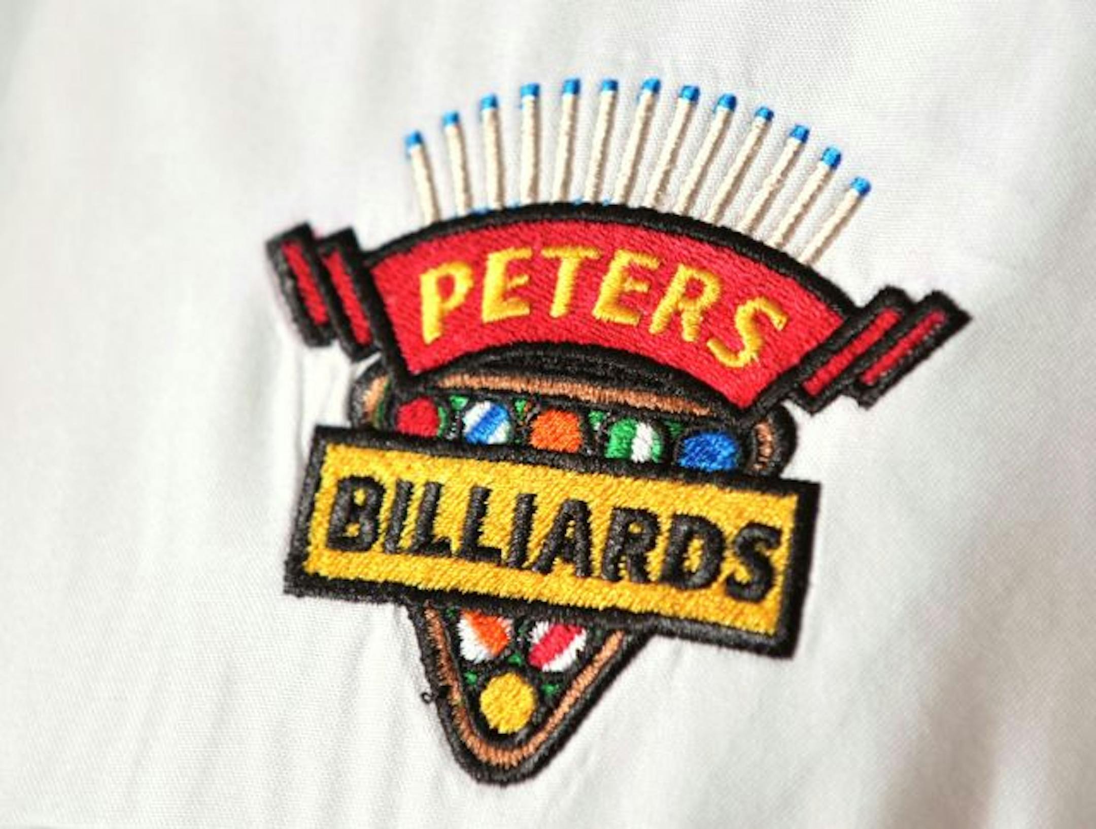 Peters Billiards logo.