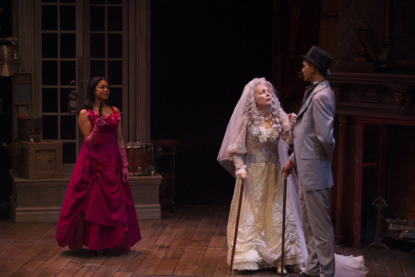 Hope Cervantes (Estella), Barbra Berlovitz (Miss Havisham) and Ryan Colbert (Pip) in "Great Expectations" at Park Square Theatre. credit: Petronella J. Ytsma