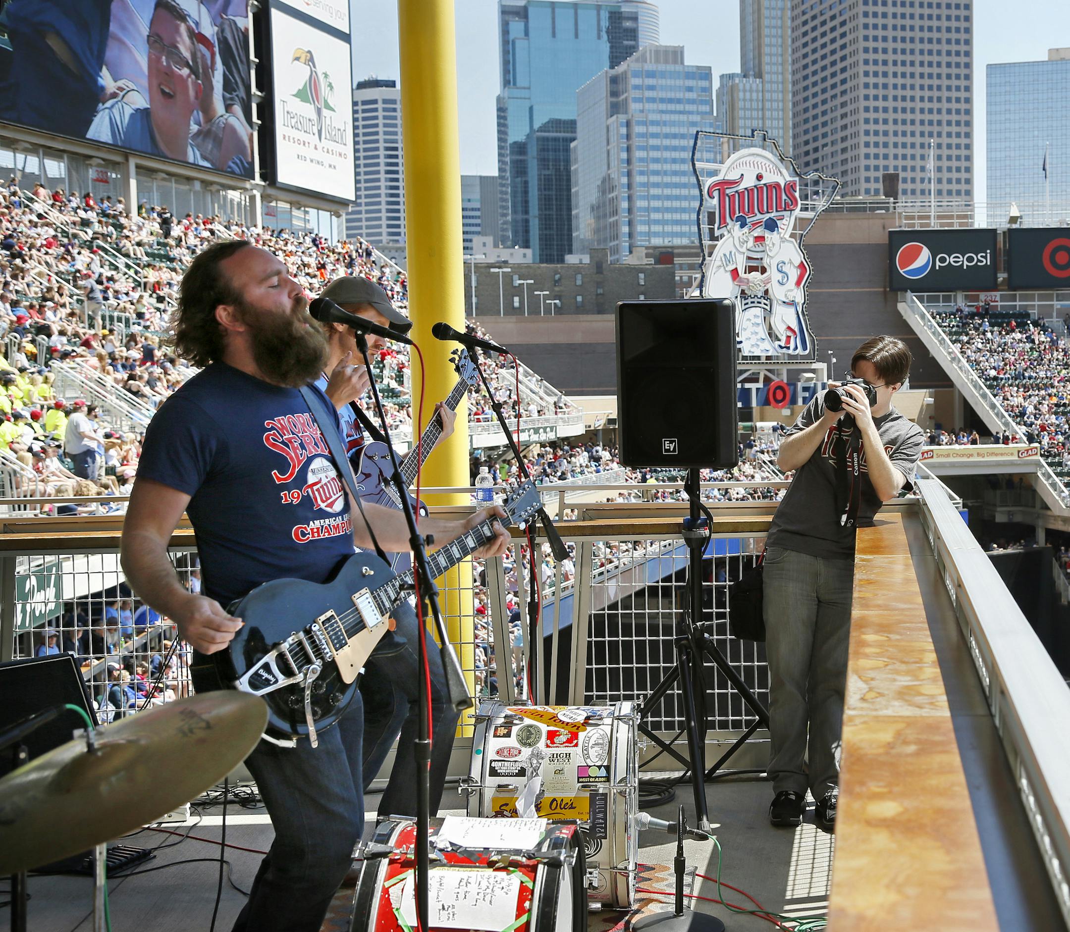 The Twins are featuring local bands in a big way this season. Here, 4onthefloor performs from the 3rd deck during the Twins White Sox game Wednesday afternoon. ] Minnesota Twins -vs- Chicago White Sox - Target Field BRIAN PETERSON ‚Ä¢ brianp@startribune.com Minneapolis, MN - 05/15/2013 ORG XMIT: MIN1305151508190448