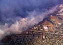 This photo taken from video provided by CBS2/KCAL9 shows a wildfire burning in Camarillo, Calif., Thursday afternoon, Nov. 8, 2018. Known as the Hill 