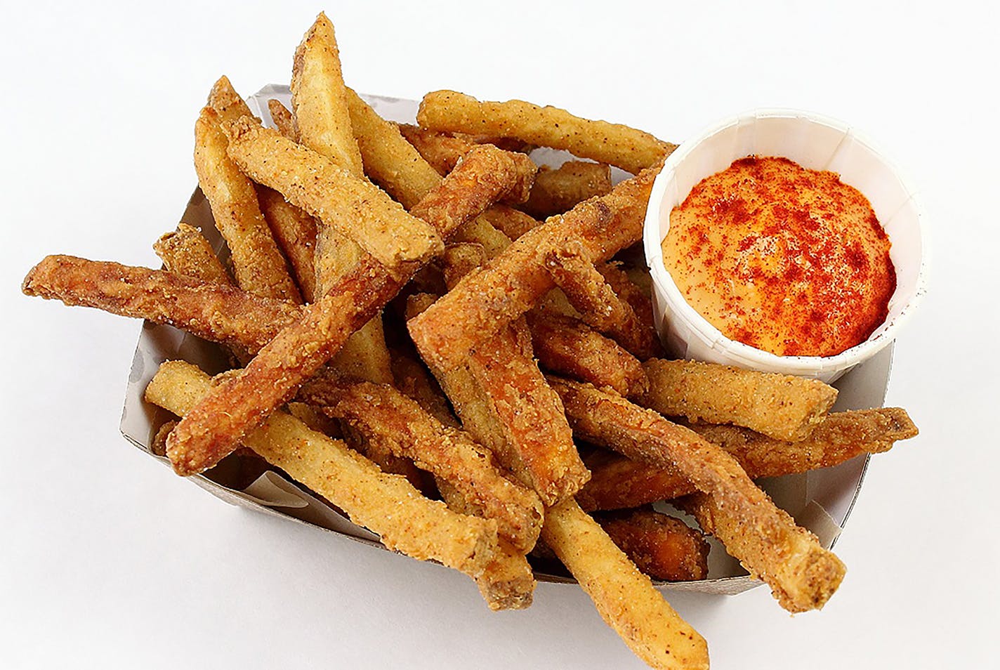 Indi Frites: Indian-seasoned russet and sweet potato fries in a crispy batter. Find it at Hot Indian located at Taste of Midtown Global Market at the International Bazaar, east wall. Available Aug. 27 – Sept. 1 only.