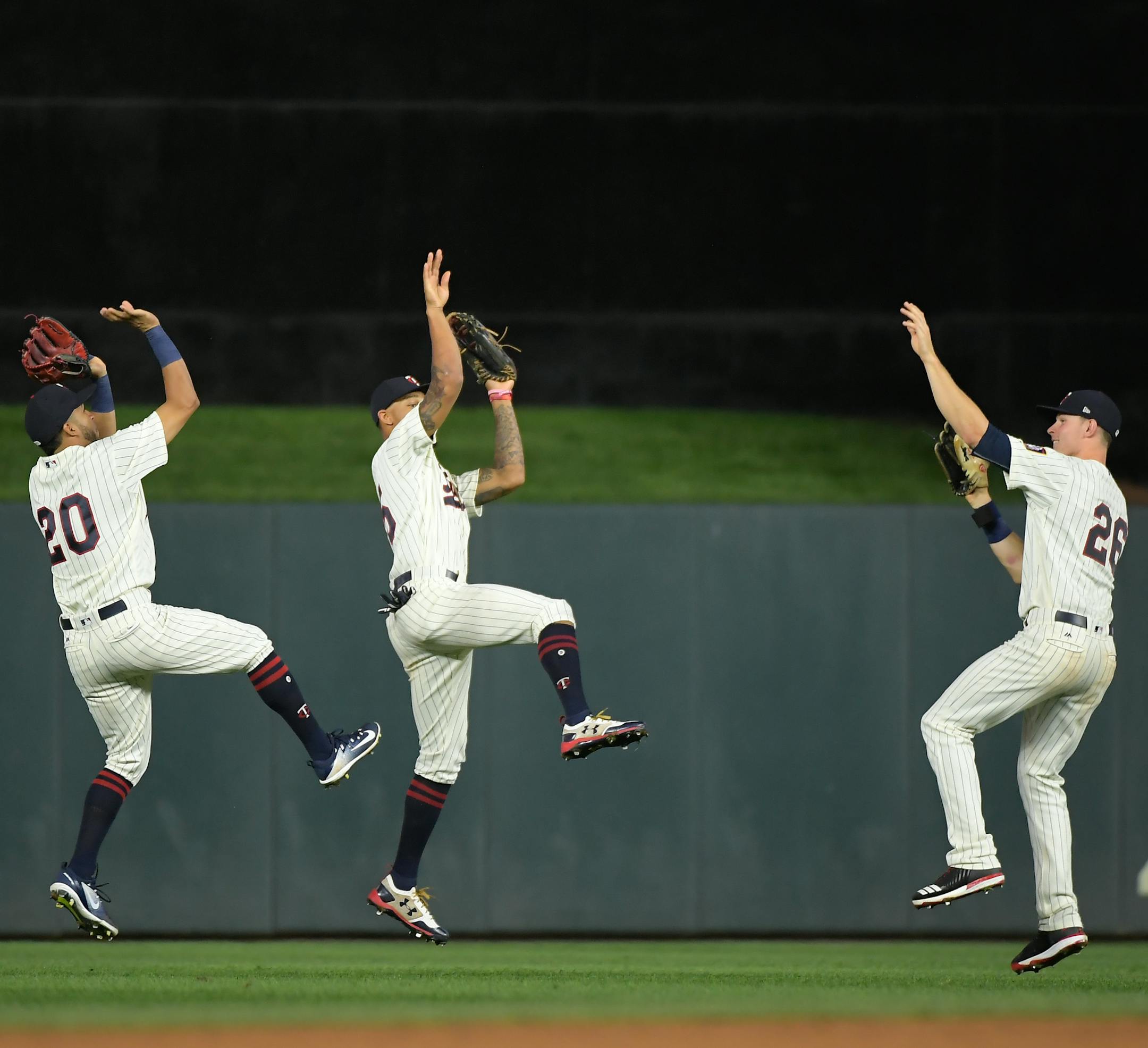 From left, Eddie Rosario, Byron Buxton and Max Kepler showed their three-point shooting form after the Twins beat Arizona Aug. 19. “Mine never goes,” Kepler said.