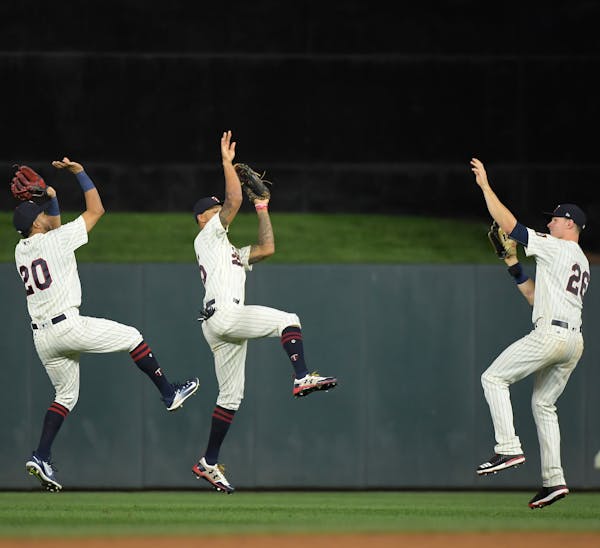 From left, Eddie Rosario, Byron Buxton and Max Kepler showed their three-point shooting form after the Twins beat Arizona Aug. 19. &#x201c;Mine never 