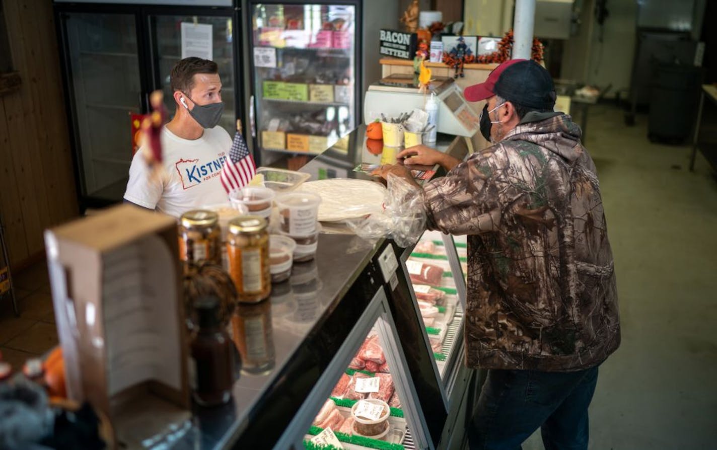 Tyler Kistner, talked with Mike Illetschko, owner of Illetschko's Meats in South St. Paul. Kistner, the Republican candidate for CD2, is literally running through the district.