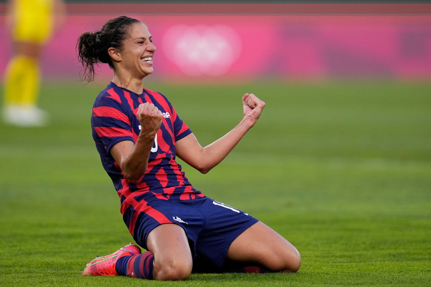 United States' Carli Lloyd celebrates scoring her side's 4th goal against Australia in the women's bronze medal soccer match at the 2020 Summer Olympics, Thursday, Aug. 5, 2021, in Kashima, Japon. (AP Photo/Fernando Vergara)