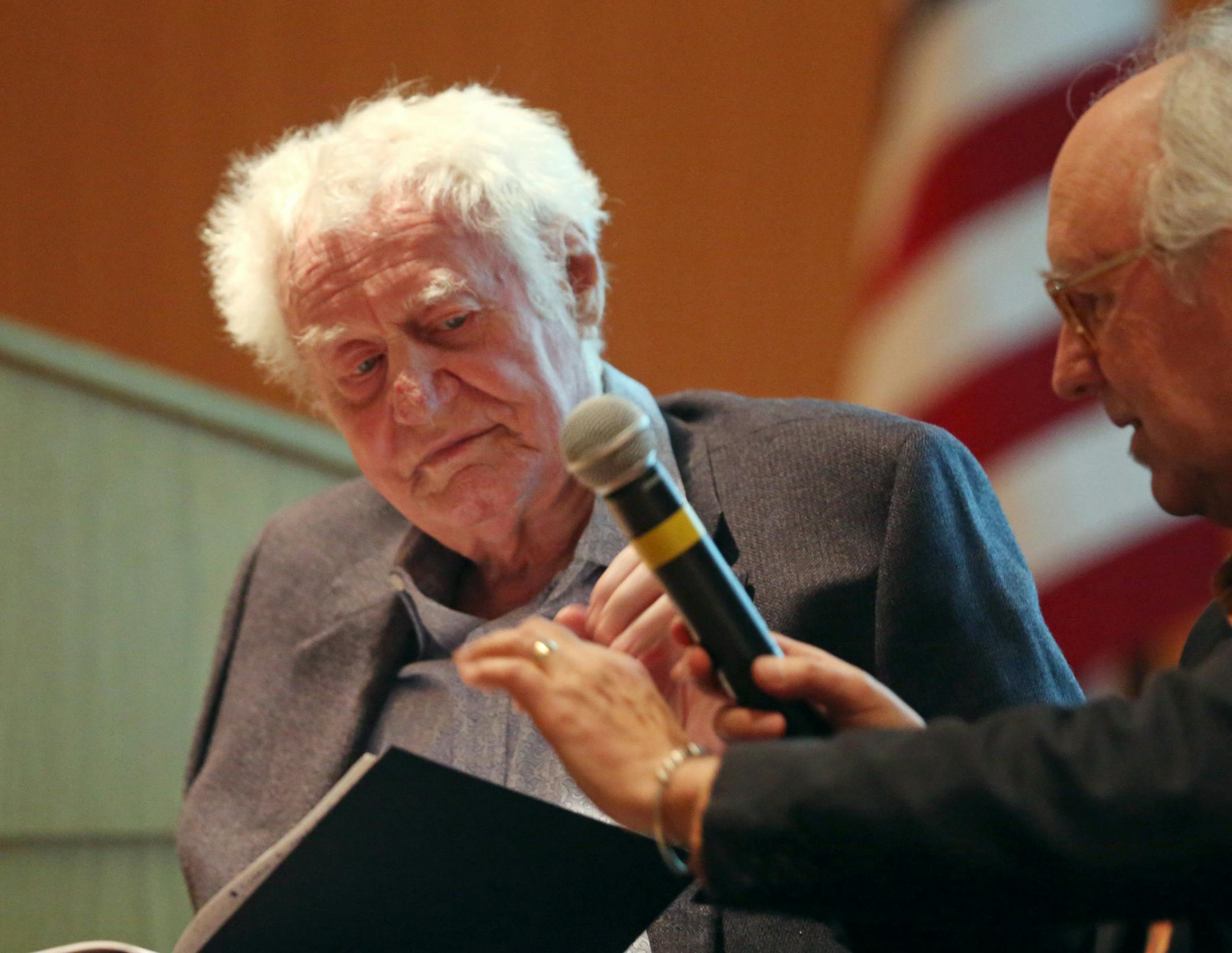 Thomas R. Smith right held a microphone for Robert Bly during a reading of l his latest book "Airmail" at the American Swedish Institute Tuesday April, 02 2013 in Minneapolis, MN. The book is a collection of letters between Bly and Swedish poet Tomas Transtromer. ] JERRY HOLT ‚Ä¢ jerry.holt@startribune.com ORG XMIT: MIN1304022033184622