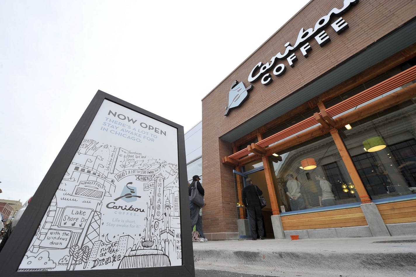 COMMERCIAL IMAGE - In this photo taken by AP Images for Caribou Coffee, Caribou Coffee introduces their new store archetype on Tuesday, Oct. 18, 2011, in Chicago. (Brian Kersey/AP Images for Caribou Coffee) ORG XMIT: ILBK404