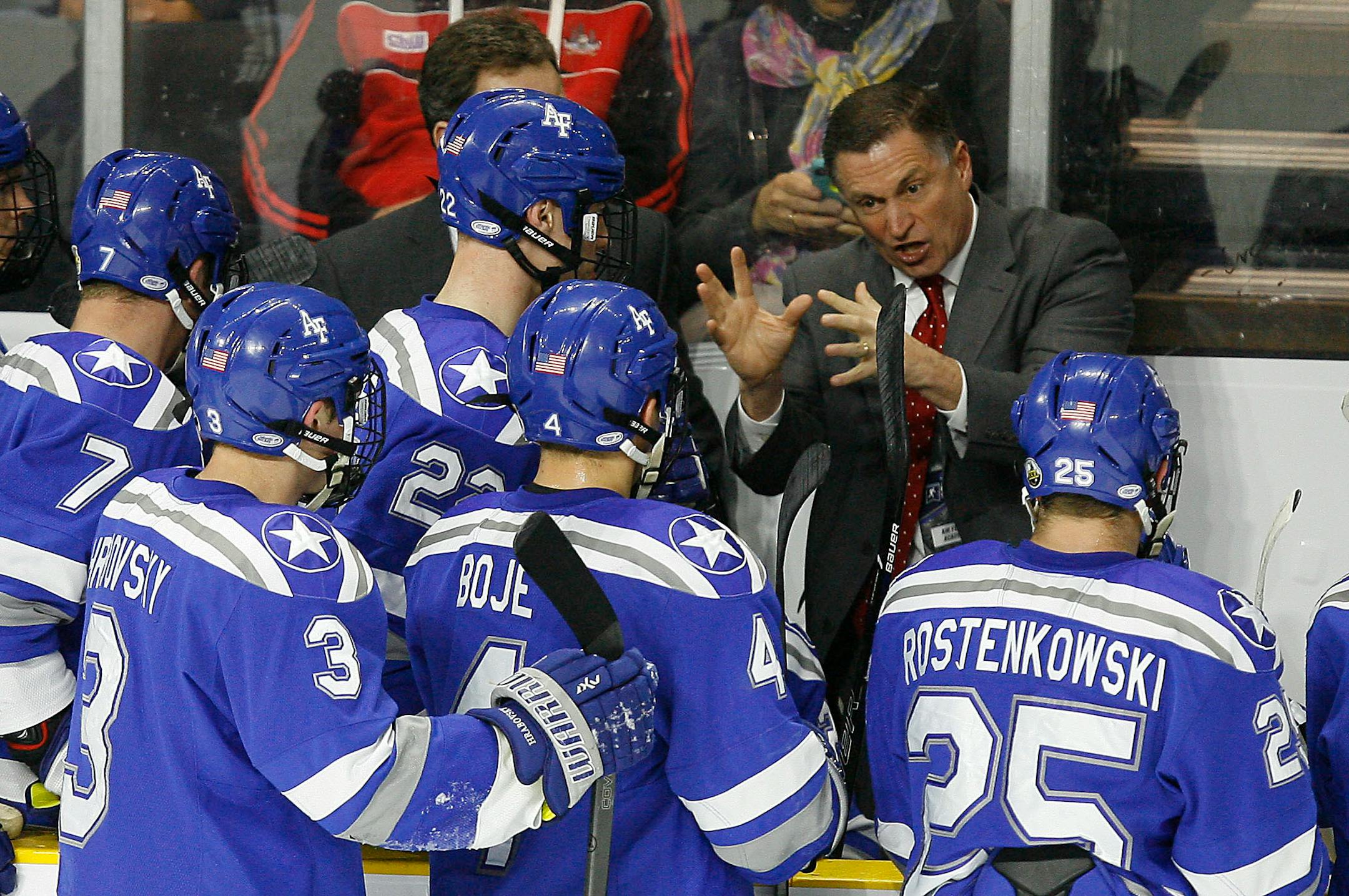 Air Force head coach Frank Serratore talks with his team during a time out during the first period of an NCAA regional men's college hockey tournament game against Harvard, Saturday, March 25, 2017 in Providence, R.I. (AP Photo/Stew Milne)