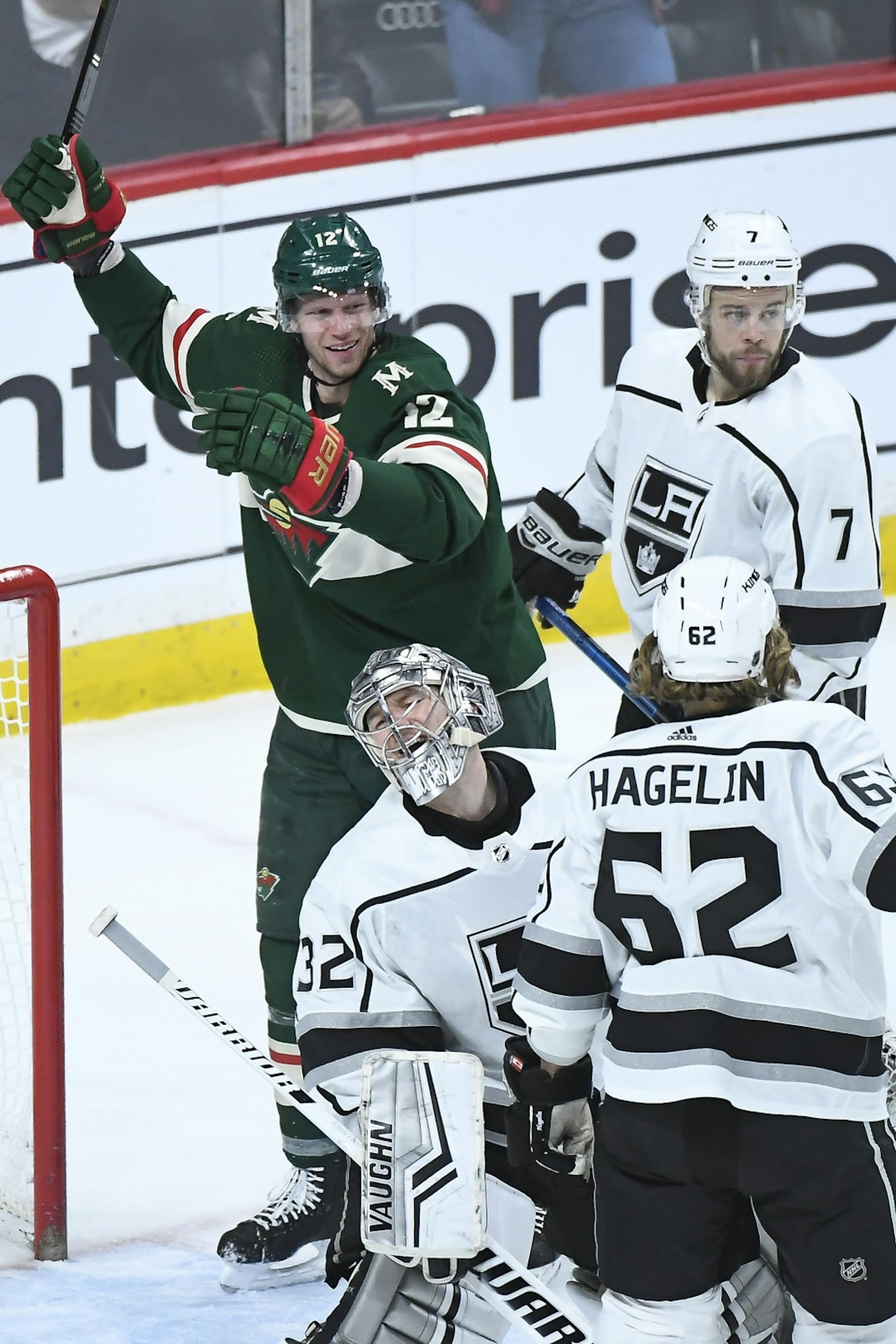 Los Angeles Kings goaltender Jonathan Quick (32) was dejected after a third period goal by Minnesota Wild center Eric Staal (12).