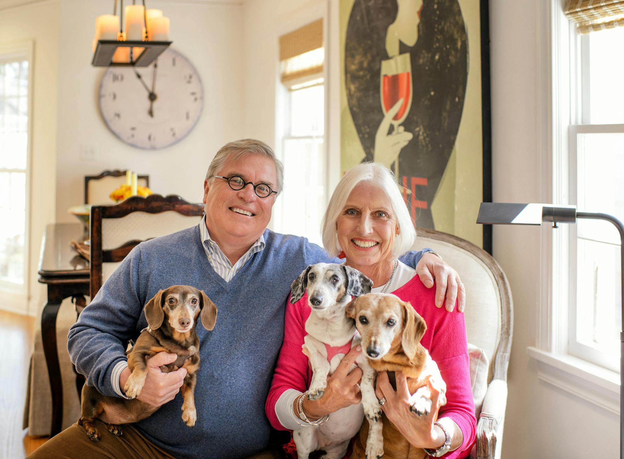 Bryn Vaaler and Schelly Braden, with their dachshunds, sold their big Uptown condo and then remodeled a compact Cape Cod, which offers a back yard and primarily main-floor living.