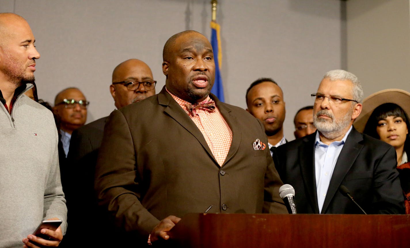 Sen. Jeff Hayden, DFL-Minneapolis, spoke at the United Black Legislative Agenda press conference Wednesday, April 6, 2015, at the State Office Building in St. Paul, MN. Looking on is the event MC Anthony Newby, left, executive director of Neighborhoods Organizing for Change.