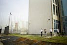 Personnel of the American Embassy in Havana inspect the damage caused by Hurricane Irma to the embassy property, in Cuba, Sunday, Sept. 10 2017. Power