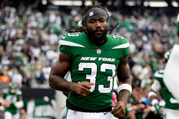 New York Jets running back Dalvin Cook (33) takes the field to face the Philadelphia Eagles in an NFL football game Sunday, Oct. 15, 2023, in East Rut
