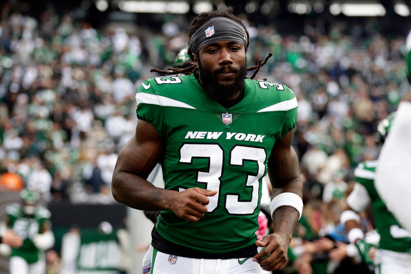 New York Jets running back Dalvin Cook (33) takes the field to face the Philadelphia Eagles in an NFL football game Sunday, Oct. 15, 2023, in East Rutherford, N.J. (AP Photo/Adam Hunger)