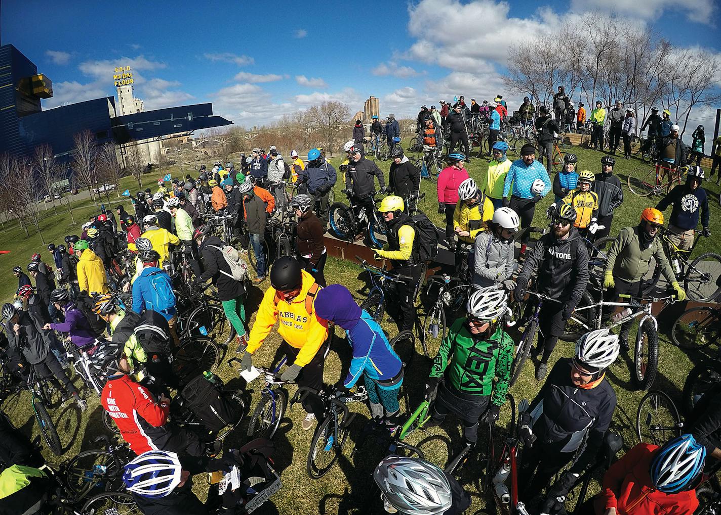 Bicyclists gathered at Gold Medal Park to hear instructions and to pose for photographs before the ride.