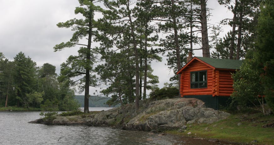 Many of the cabins at Burntside Lodge, a family-owned resort in Ely, Minn., hug Burntside Lake. [by Kerri Westenberg]