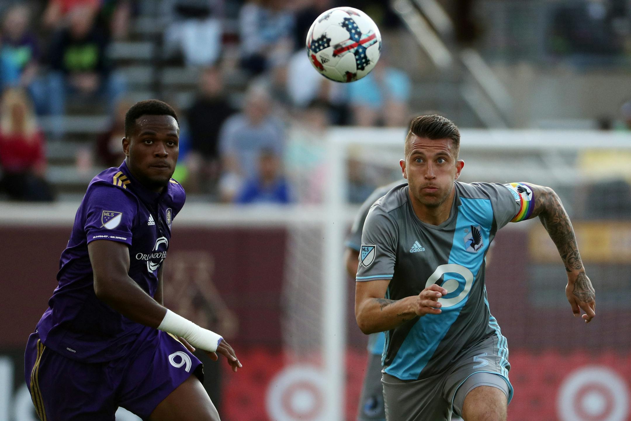 Minnesota United defender Francisco Calvo (5) raced Orlando City SC forward Cyle Larin (9) for the the ball in the first half. ] ANTHONY SOUFFLE ï anthony.souffle@startribune.com Game action from an MLS game between the Minnesota United and the Orlando City SC Saturday, May 27, 2017 at TCF Bank Stadium in Minneapolis.