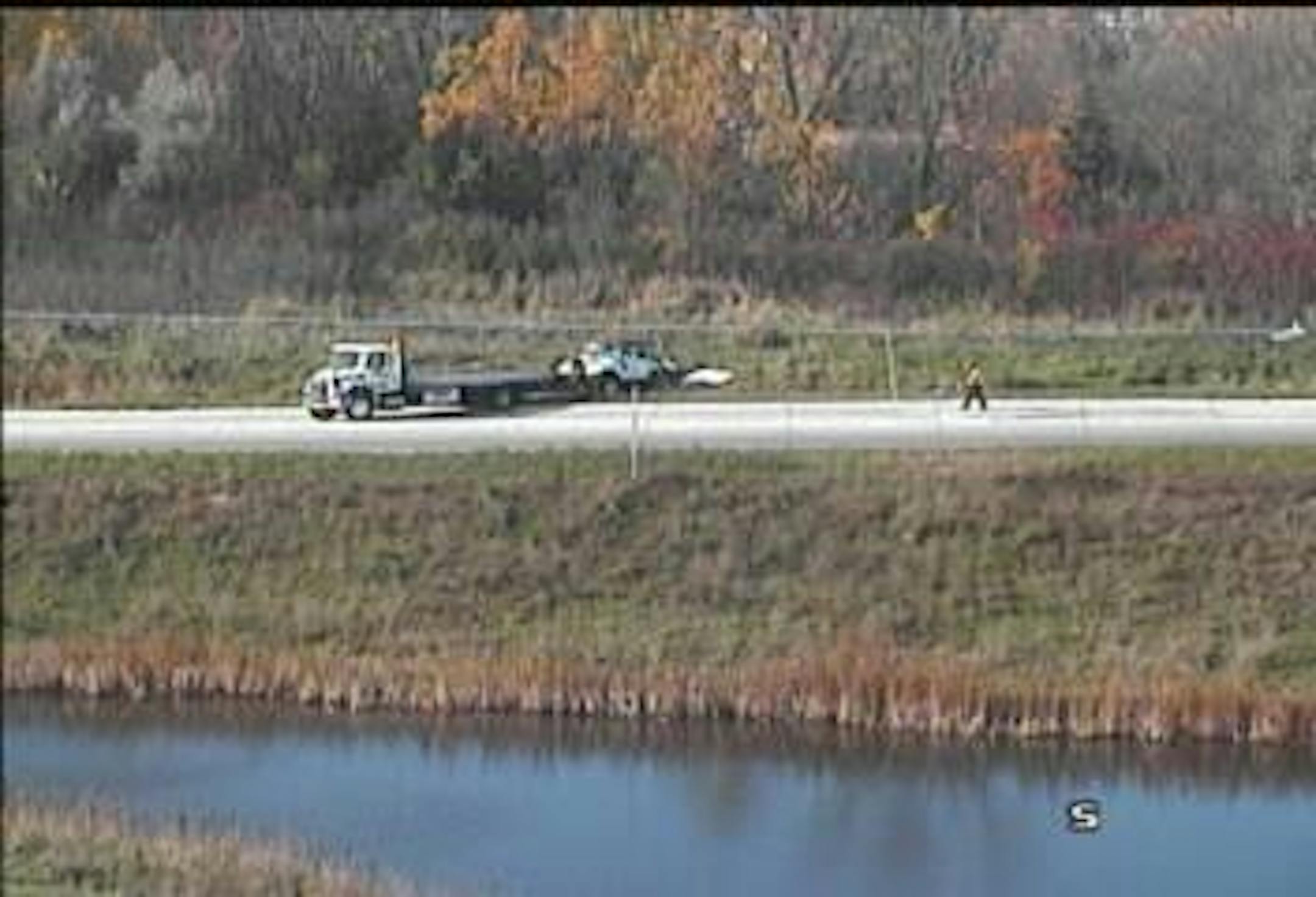 A white Jeep Wrangler reportedly stolen was towed from a ditch after the driver crashed on a freeway entrance ramp Monday morning in Plymouth.