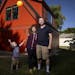 Stephanie Erickson and Ross Pfund built an accessory dwelling unit in their backyard in Minneapolis. They're pictured with their son, Quinlan.