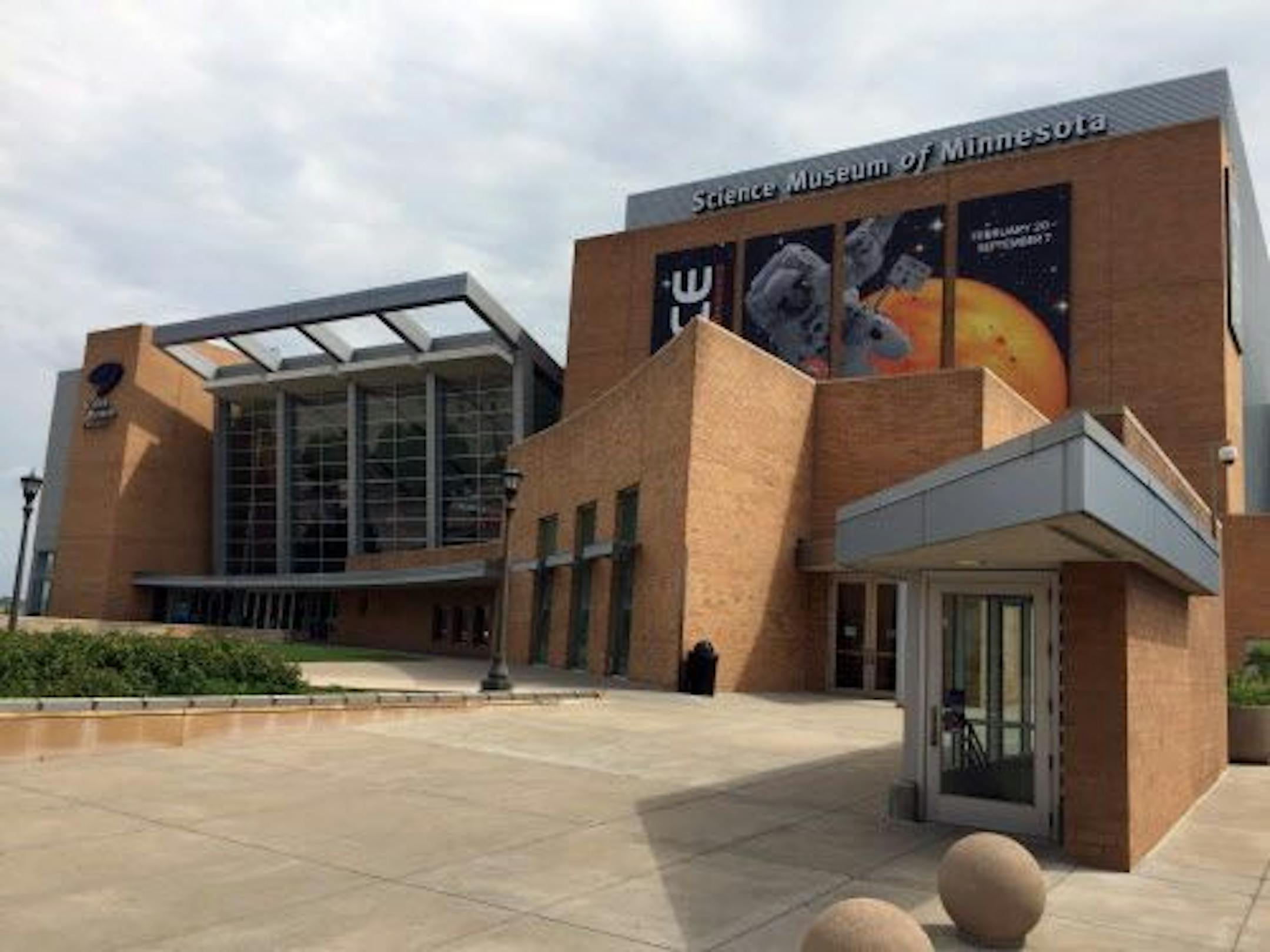 FILE - This June 24, 2015 file photo shows the Science Museum of Minnesota in St. Paul, Minn. The museum won't appeal a legal loss in a case against a design firm over persistent water damage to its $100 million building, interim museum president John Stanoch told The Associated Press on Friday, Sept. 4, 2015.