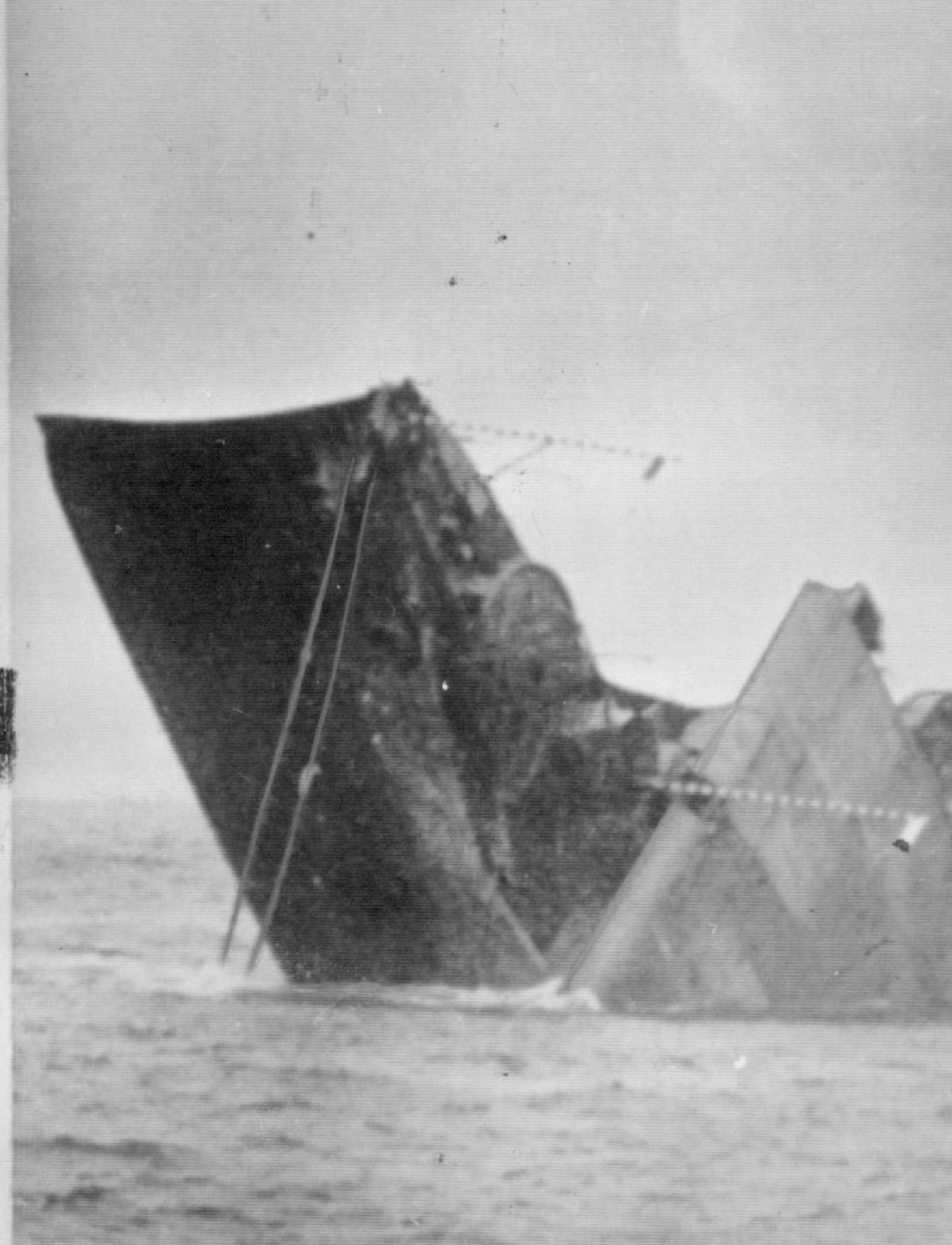 February 1, 1951 At the right, the bow of the 10,000 ton carrier was flung high as the independence started its death plunge. AP Wirephoto; Minneapolis Star Tribune