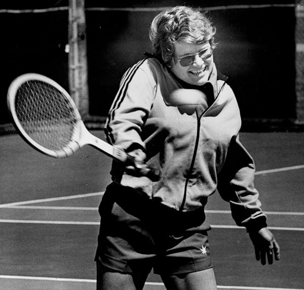 Belmar Gunderson is pictured playing tennis in 1975, when she was the women’s athletic director at the University of Minnesota