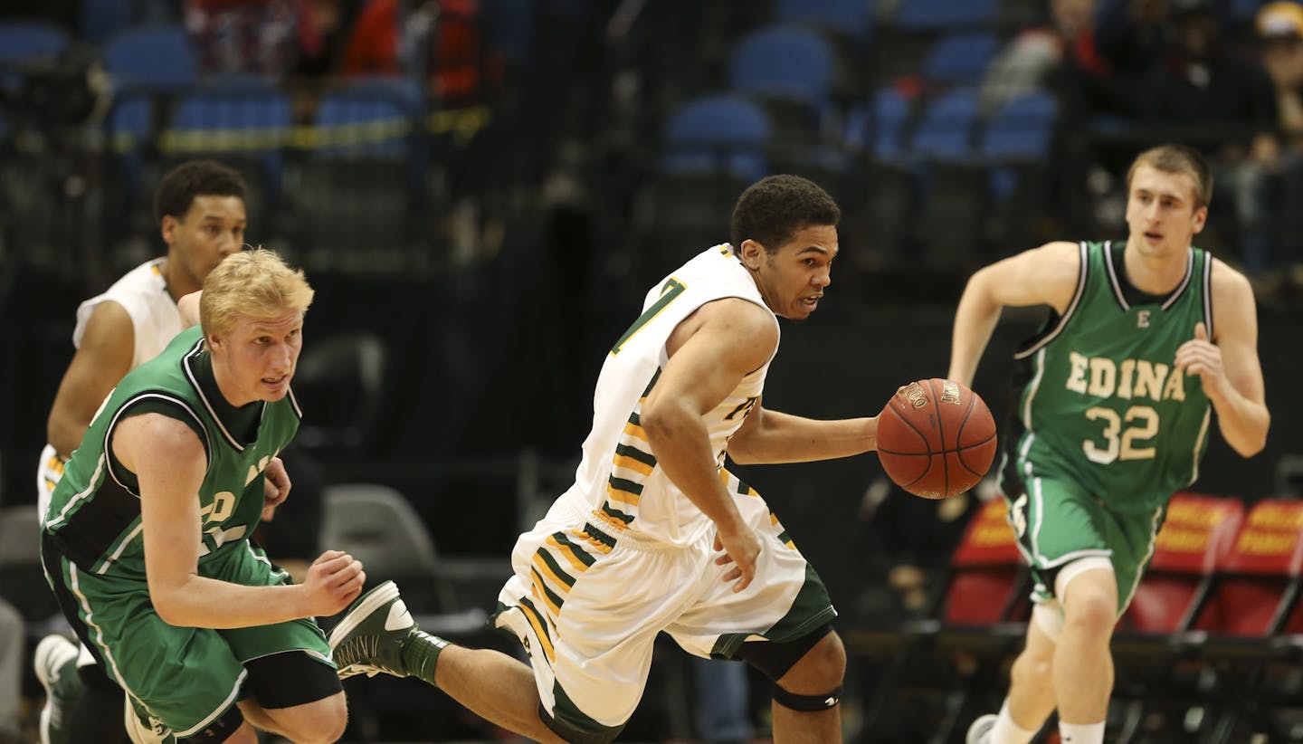 Park Center met Edina in a Class 4A Boys' Basketball State Tournament semifinal game Thursday night, March 21, 2013 at Target Center in Minneapolis. Park Center's Quinton Hooker headed upcourt on a fast break after a turnover in the first half. ] JEFF WHEELER &#x201a;&#xc4;&#xa2; jeff.wheeler@startribune.com ORG XMIT: MIN1303212135150255