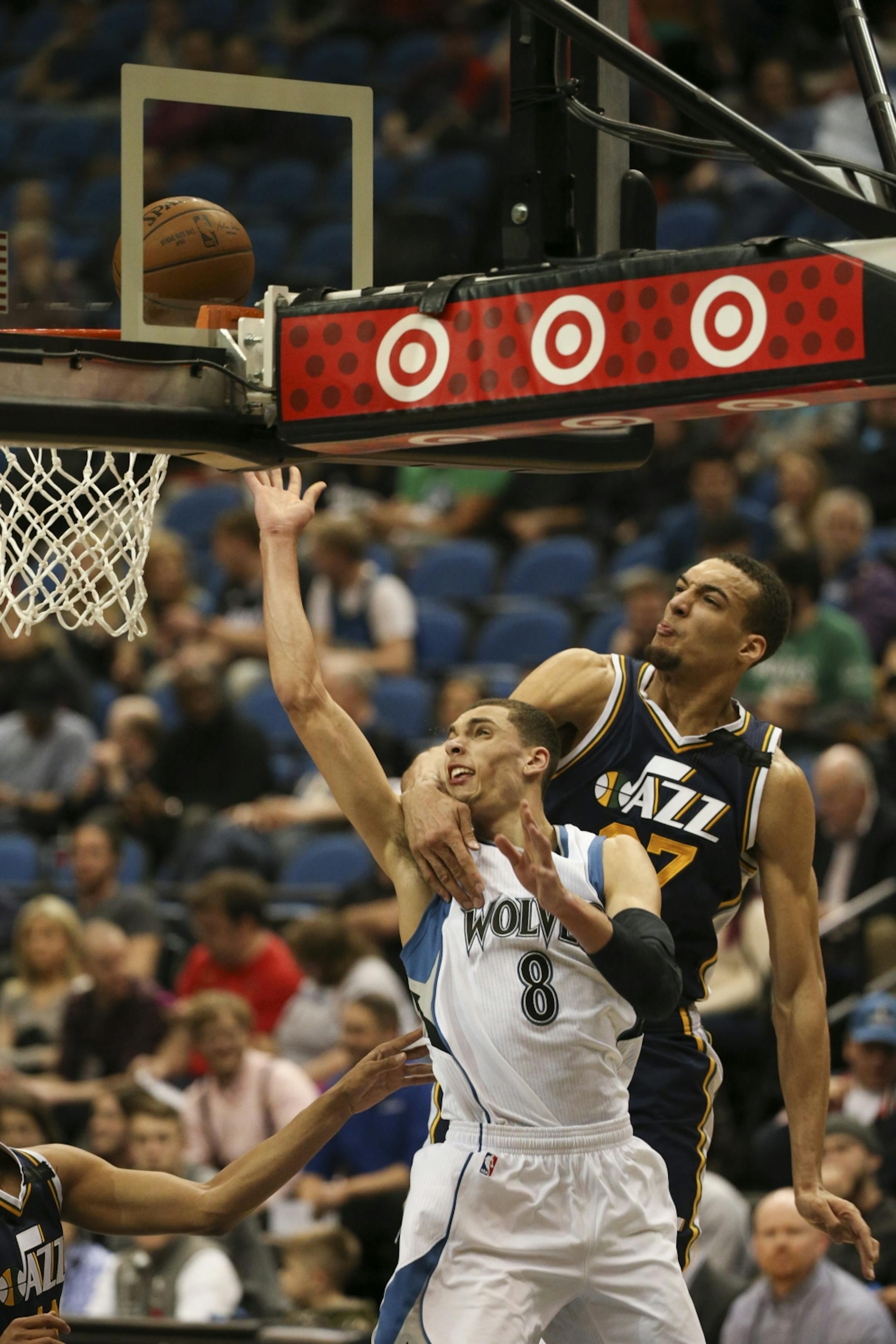 Timberwolves guard Zach LaVine was fouled by Utah Jazz center Rudy Gobert as he took a shot in the fourth quarter Monday night at Target Center. LaVine led the Wolves with 21 points.