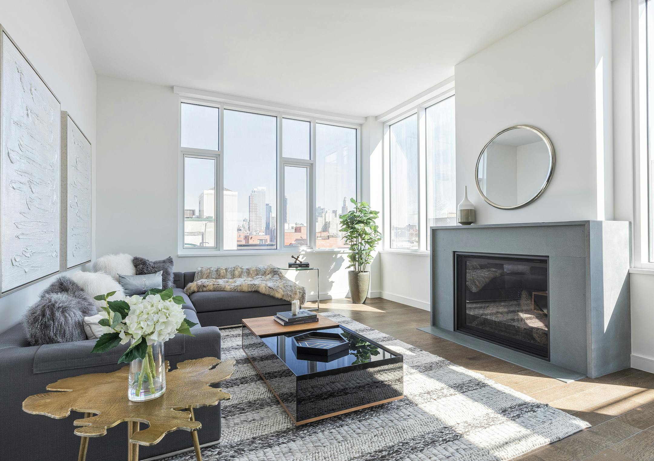 A mirror above a fireplace is an attractive decor choice and can help add interest.