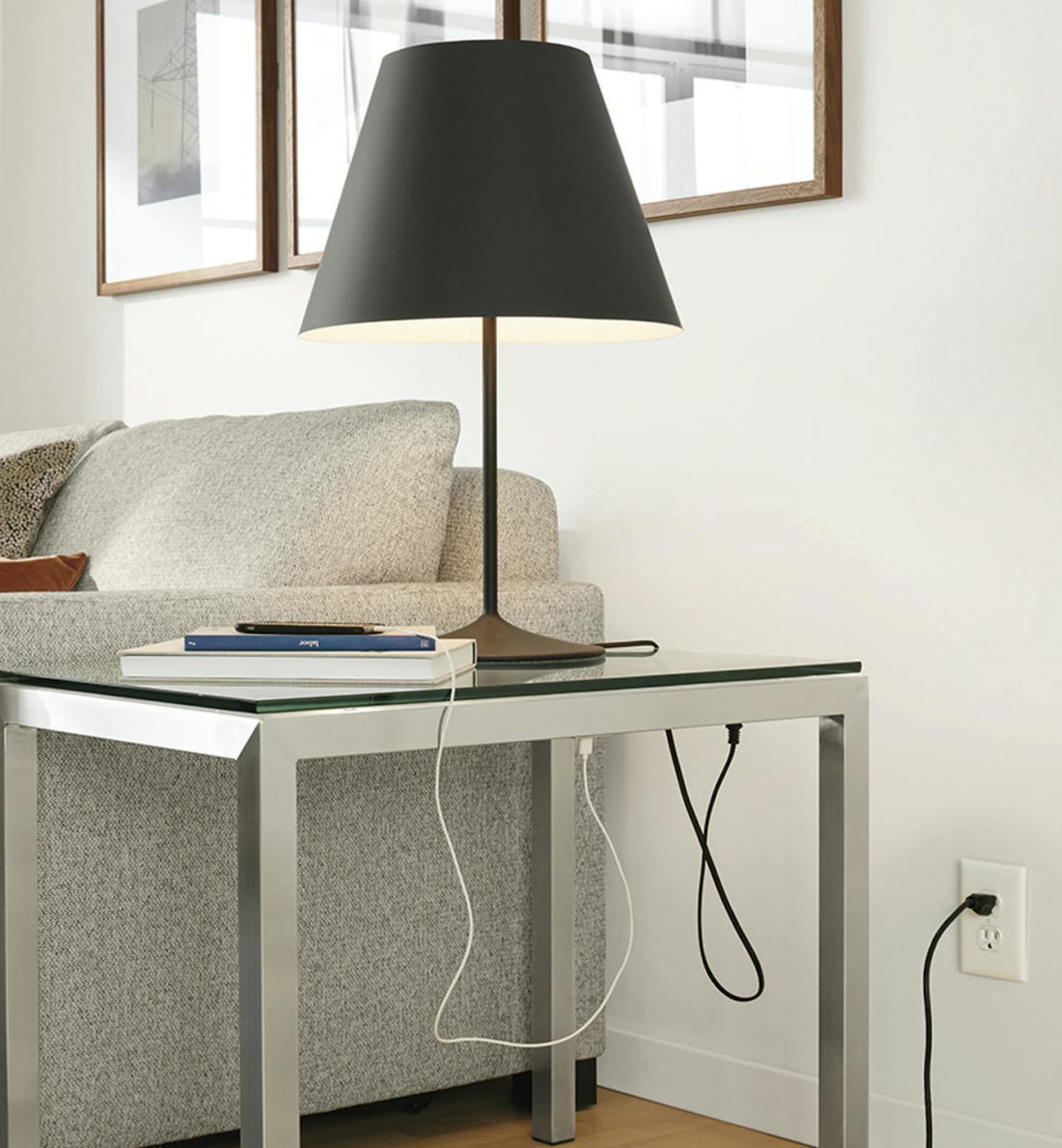 This photo provided by Room & Board shows the Portica end table from Room & Board, which comes both standard and in a C-shaped version, which can be useful for tight spaces. Choose your own top: glass, quartz or marble composite, or woods like walnut, maple, spalted sugarberry and ash. (Room & Board via AP) ORG XMIT: NYLS305