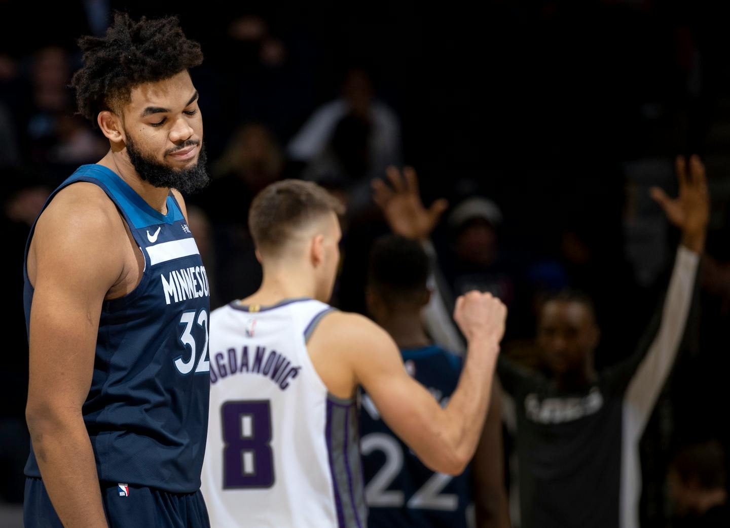 Timberwolves center Karl-Anthony Towns walked off the court in disbelief of his team's collapse as guard Bogdan Bogdanovic and the Kings celebrated their 133-129 overtime victory over the Wolves at Target Center on Monday night.